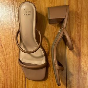 A New Day nude strappy block heels.